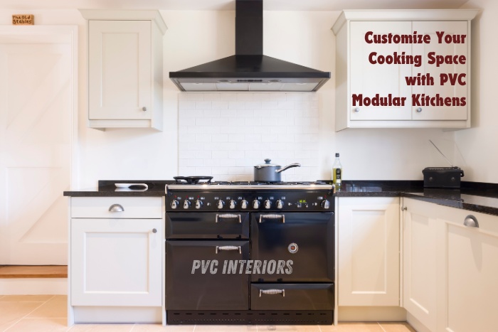 PVC modular kitchen design with modern black appliances by PVC Interiors customizable kitchen solutions for efficient cooking spaces